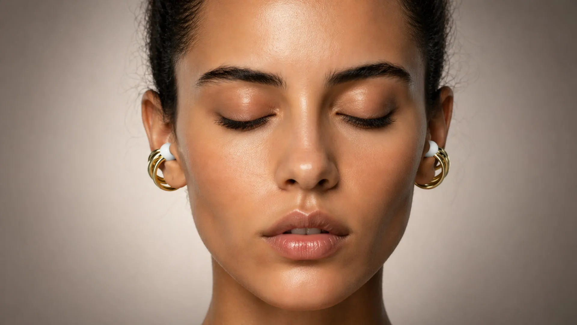 Elara wearable audio device front view in ear